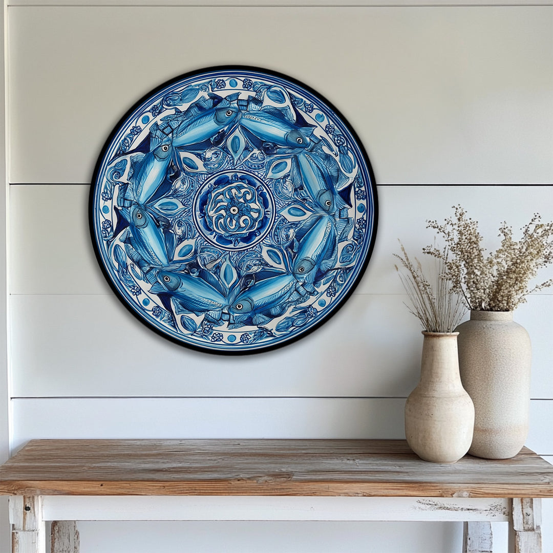 Symmetrical arrangement of fish and floral motifs within the round blue mandala canvas art prints form a captivating geometric pattern, enhancing its coastal decorative appeal.