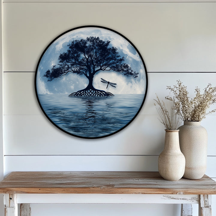 Framed canvas features a black edge highlighting a moonlit tree reflection, creating serene night landscape wall art with a circular border.