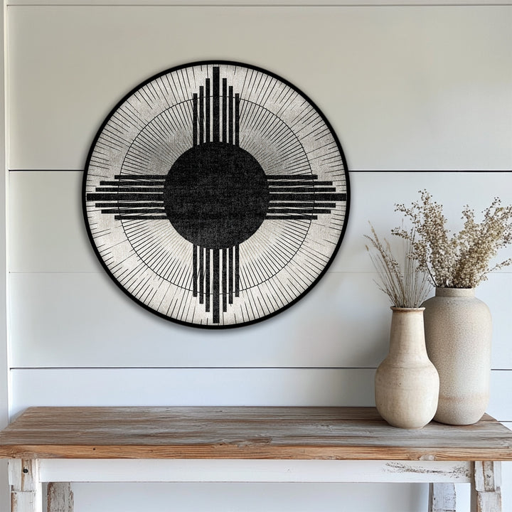 Horizontally oriented, the round best canvas prints display an abstract geometric sunburst design, ideal for minimalist wall art.