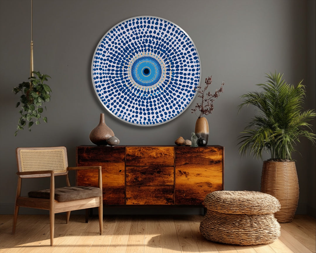 Against a dark grey background, a round blue evil eye mandala design enlivens this stylish canvas wall art with a protective symbol.