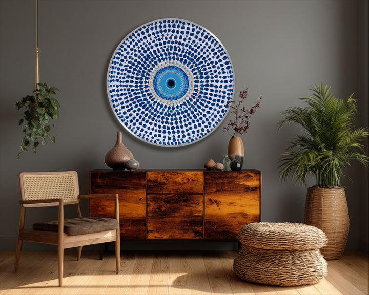Against a dark grey background, a round blue evil eye mandala design enlivens this stylish canvas wall art with a protective symbol.