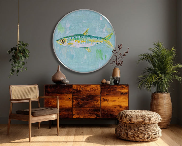 Highlighting the abstract quality, this round canvas pictures features a dreamy, pastel fish painting, lending coastal charm to minimal wall art.
