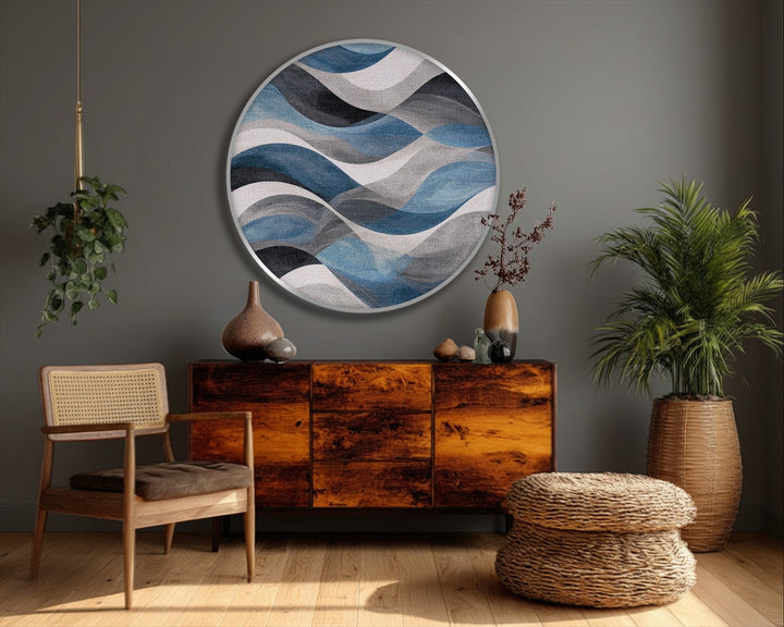 Highlighting the geometric elements, this round canvas features flowing curves in blue, gray, and white to create one of the best canvas prints for a modern space.