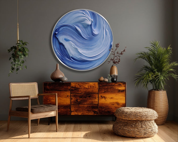Deep color contrast showcases the swirling blues and whites in this ocean flow blue abstract round canvas art, perfect for a striking canvas art statement.