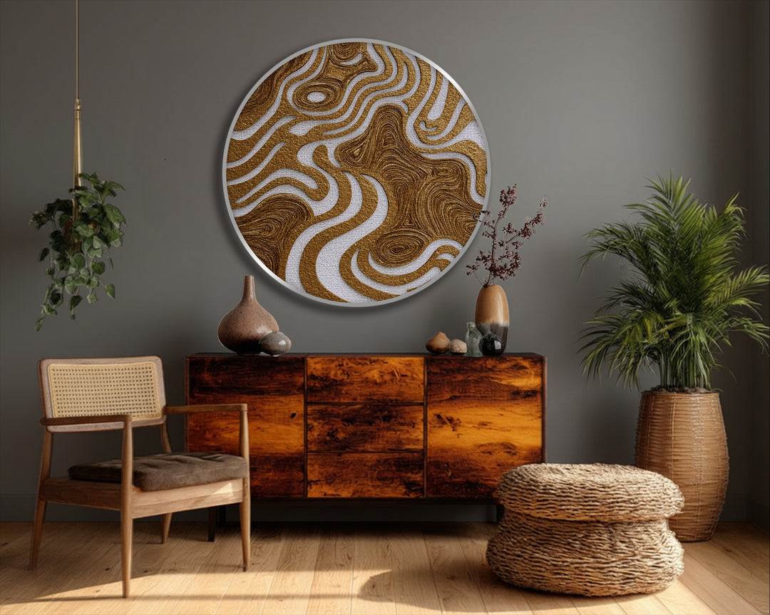 Negative space defines the white meandering channels within the golden organic flow of this round framed canvas print, a textured abstract wall art piece.