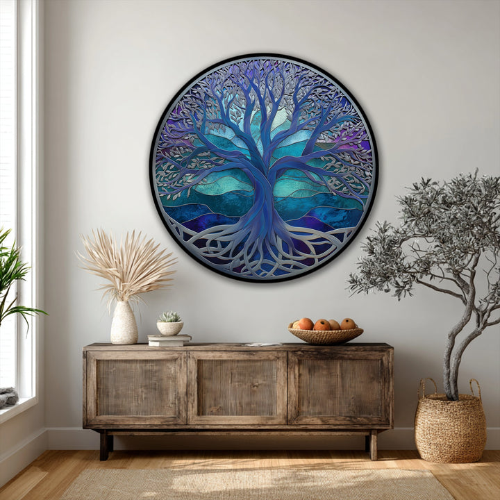 Against the muted wall, the mystic blue Tree of Life round canvas art stands out, offering a focal point that enriches the surrounding simple canvas art.