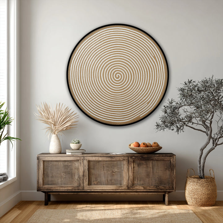 Aesthetic tranquility emanates from the minimalist interior showcasing a golden spiral round canvas artwork above the rustic wooden console, enhancing the room's serene mood.