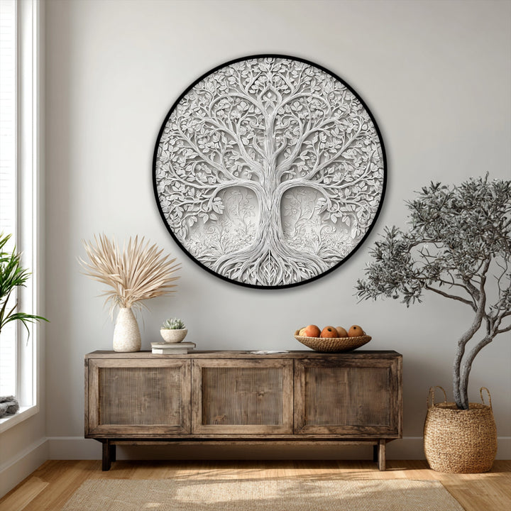 A unique canvas print featuring an elegant, round Tree of Life relief design is the loudest element in this stunning piece of botanical wall art.