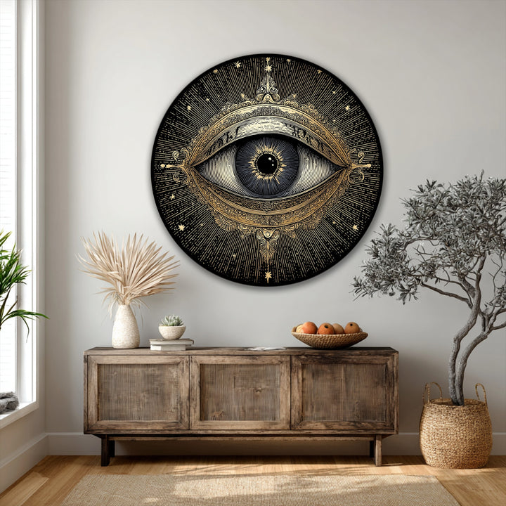 Featuring concentric circles and radial lines, the golden mystic eye round framed canvas art print creates a striking geometric celestial design.