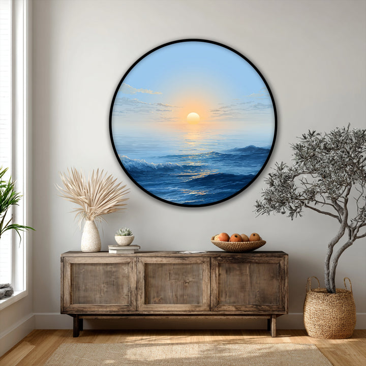 Vibrant azure and cobalt canvas pictures highlight the bold, crashing waves in this minimalist ocean sunrise round canvas print, making it the loudest element in the room.