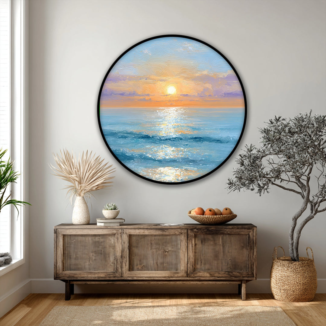 Encircling the golden sunrise over ocean round canvas art is a sleek, black border, enhancing the serene coastal canvas art with a modern canvas art touch.