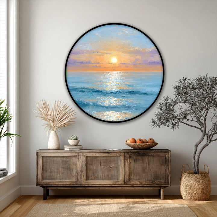 Encircling the golden sunrise over ocean round canvas art is a sleek, black border, enhancing the serene coastal canvas art with a modern canvas art touch.