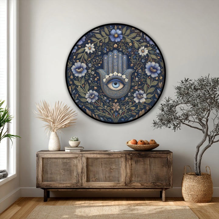 Calm and centering, this elegant floral hamsa eye design creates a spiritually botanical mood as a round canvas wall art in a beautifully styled interior.