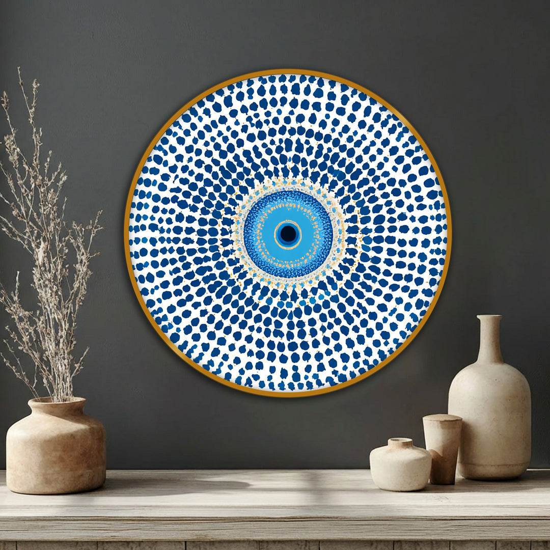 The stillness of the round framed canvas print accentuates the protective blue evil eye mandala symbol, offering a moment of peace through its decorative wall art.