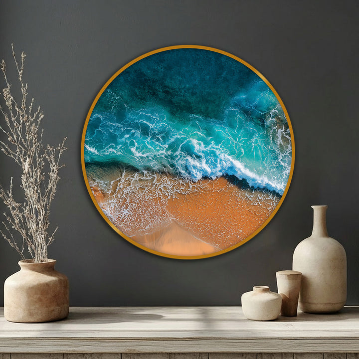 Illustrating a captivating transition between the deep turquoise ocean and the golden shoreline, this beach waves round canvas artwork highlights a stunning gradient.