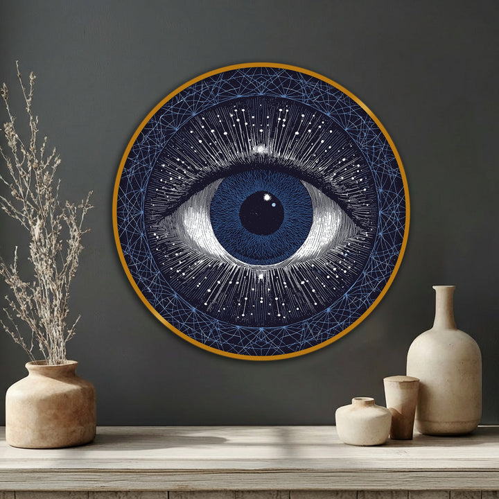 Cool color temperatures highlight the cosmic eye in this round celestial abstract wall art unique canvas print, set against a neutral backdrop.