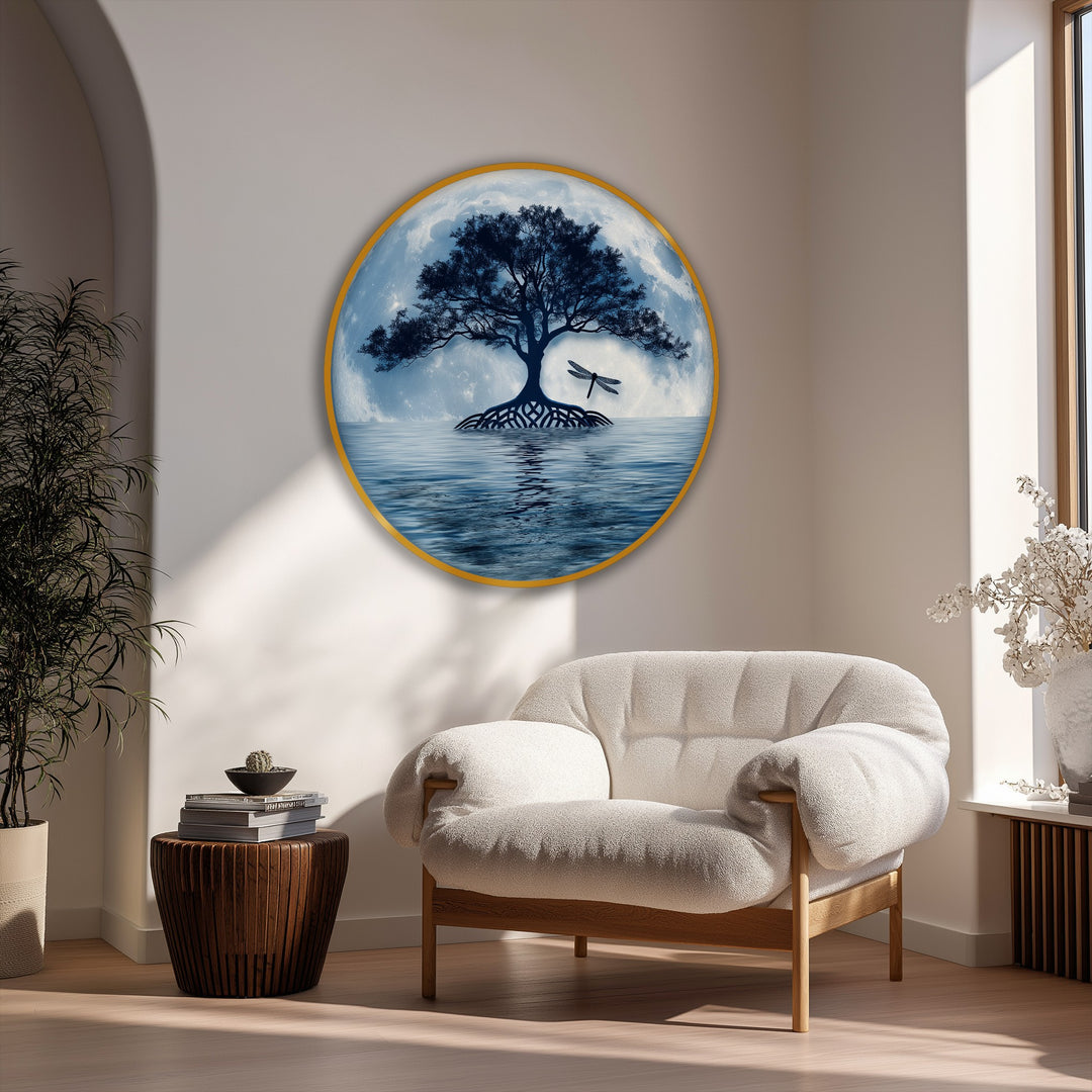 A serene round framed canvas displays a moonlit tree reflection in water, accented by a dragonfly, as a piece of framed canvas art.
