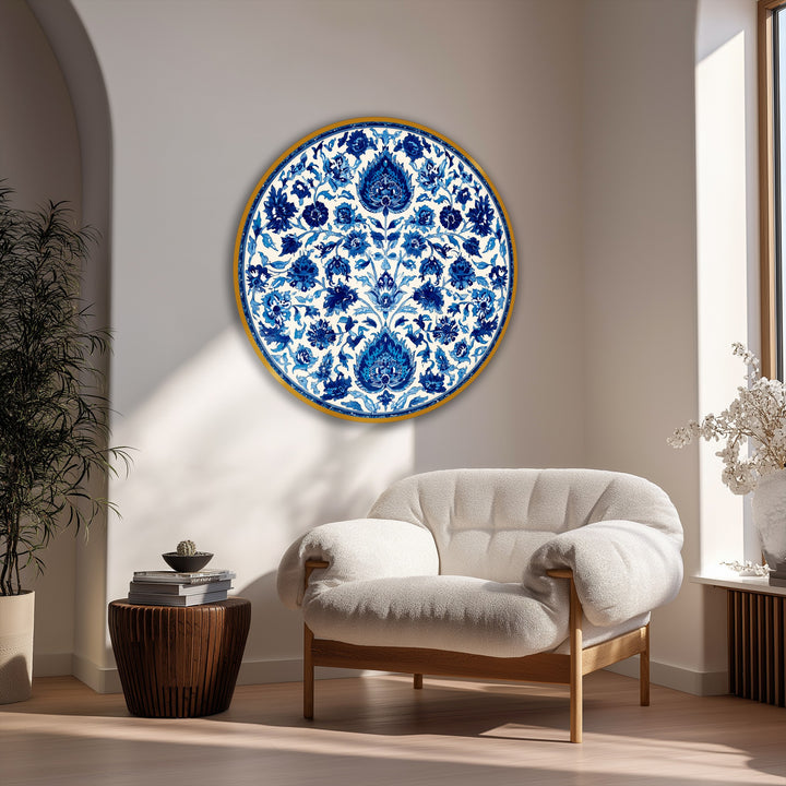 Illuminated by the sun, the light draws the eye to the intricate details of the blue floral mandala round canvas art prints that form this decorative wall art piece.