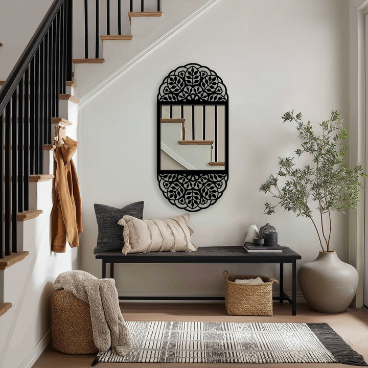 Visual rhythm is achieved through the repeating floral mandala patterns in this decorative floor mirror, a striking piece of metal wall decor.