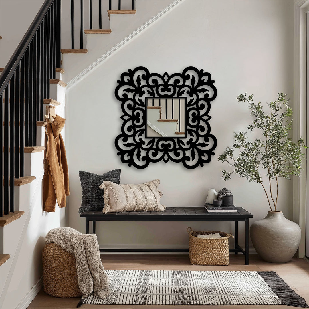 Ornate metal floral scroll frame surrounds the square floor decorative mirror, making it the loudest element in this curated entryway metal art for wall design.