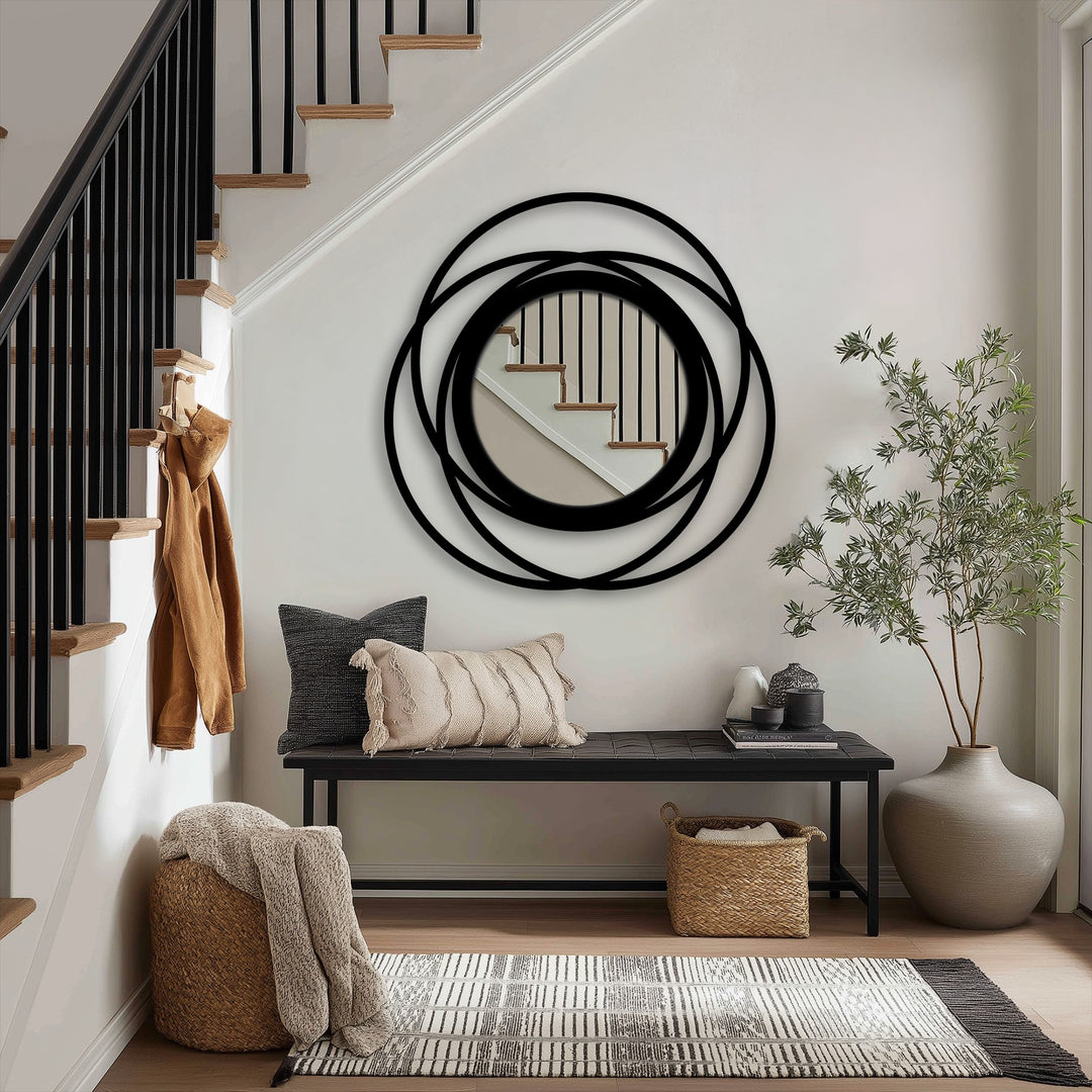 Black is the dominant color in this intertwined ring circle floor mirror, a piece of modern wall mirrors framed with layered metal rings.