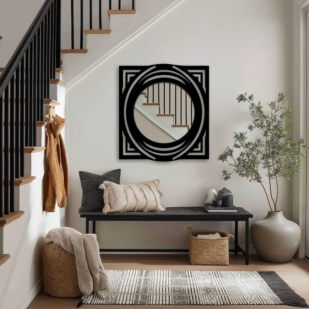 Warm color temperatures accentuate the black metal geometric frame and circular details of this square Orbit Crest floor mirror, offering decorative metal art appeal.