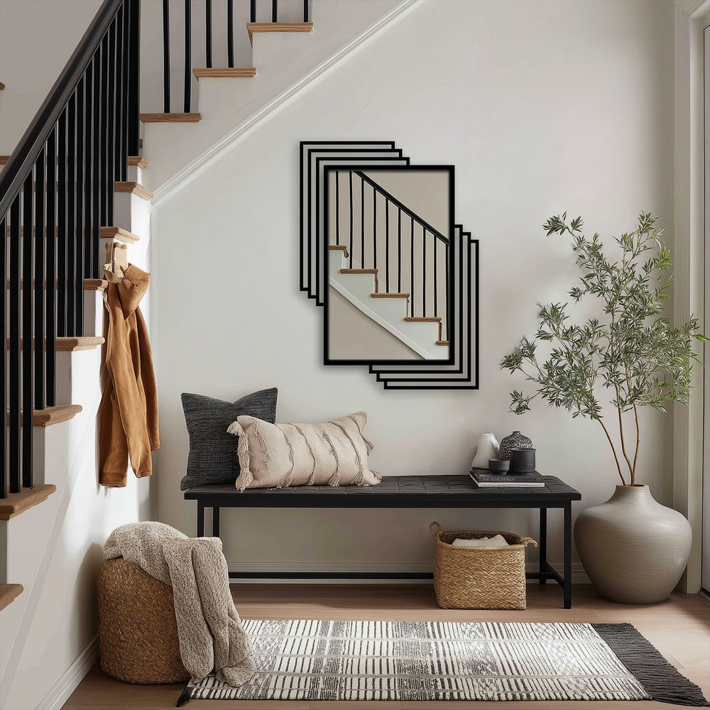 Smooth metal surfaces of the modern black layered floor mirror create a captivating contrast, exemplifying decorative metal art with its offset rectangular frames.