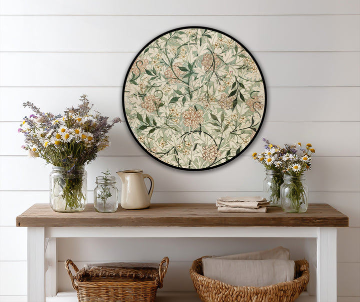 Intertwining botanical elements and soft green hues define this round oil painting art piece, emphasizing the organic forms of a vintage garden in an elegant design.