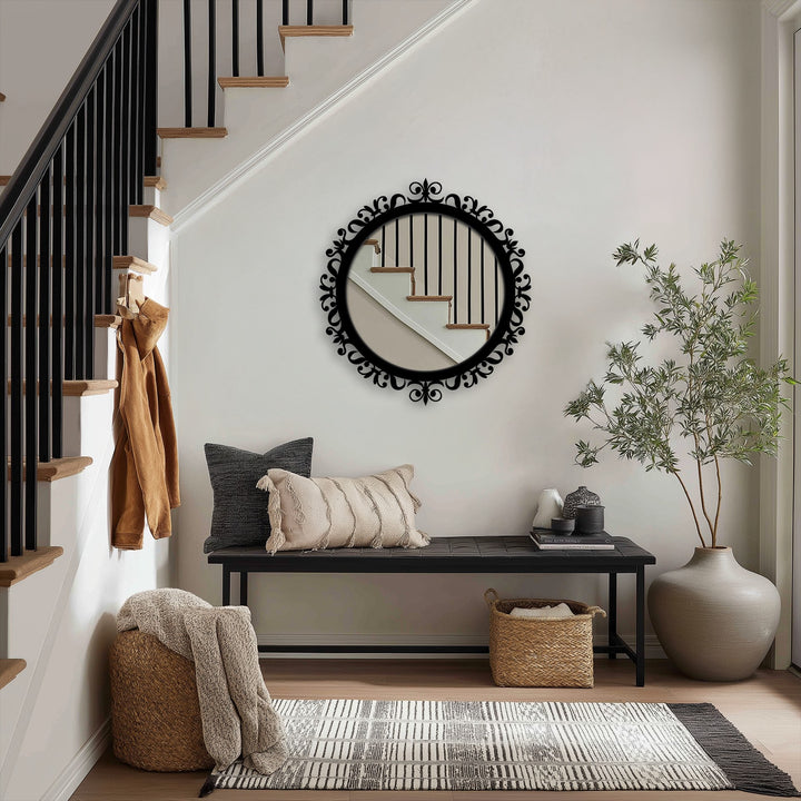 Elaborate floral carvings around the ornamental baroque-style metal edge of the round floor mirror give a vintage stained glass wall mirror accent.