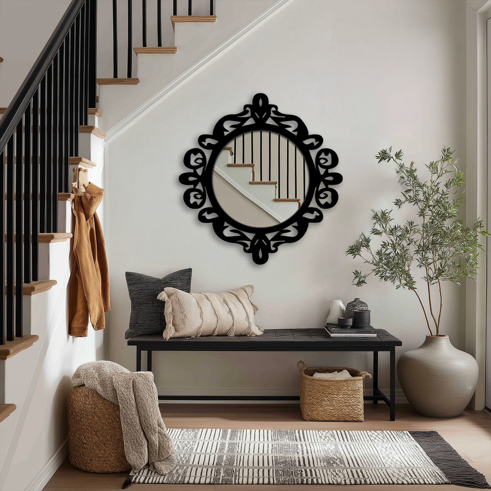 Featuring geometric elements, an ornate royal crest round floor mirror showcases a decorative mirror with a black metal statement design.