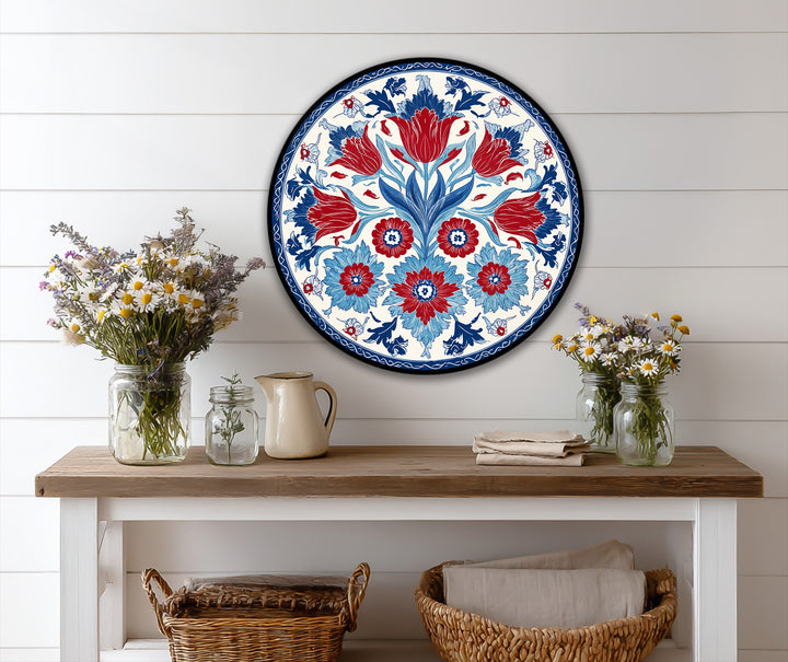 Darkest area frames a vibrant Ottoman floral motif round oil painting wall art, contrasting with the red and blue hues in this decorative piece.