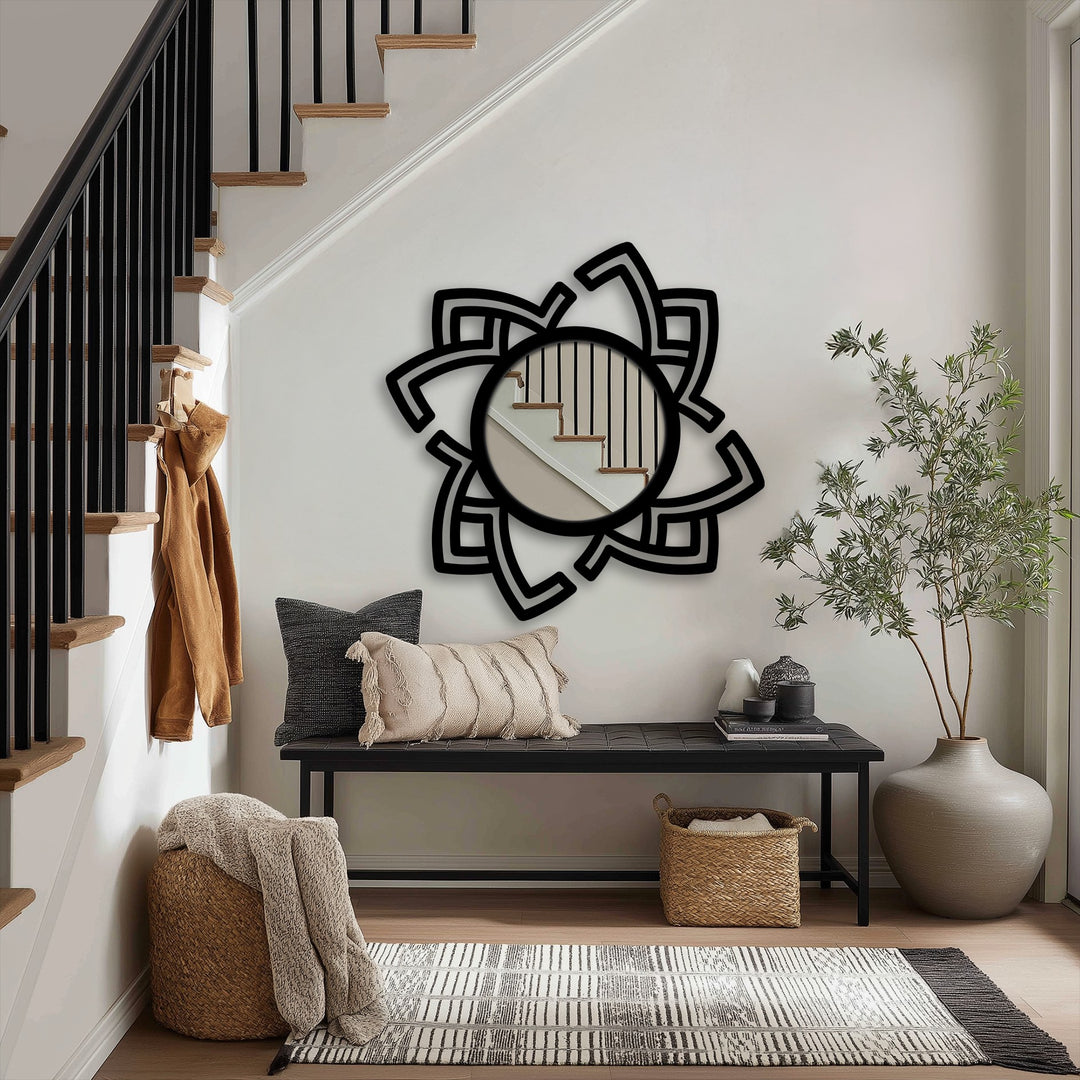 The focal point is this abstract rotating metal wall mirror showcasing modern design, making it a unique piece of metal wall decor enhancing a contemporary interior space.