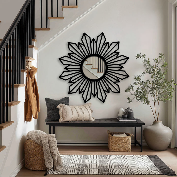 A striking sunburst geometric metal wall mirror, radiating with a modern mirror design, commands attention as a central subject in this stylish interior.