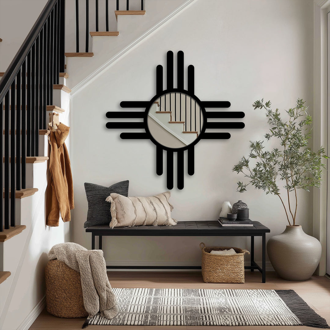 Black metal edge borders accent the round, framed wall mirror, adding a modern cross-line design to this striking framed wall mirror.