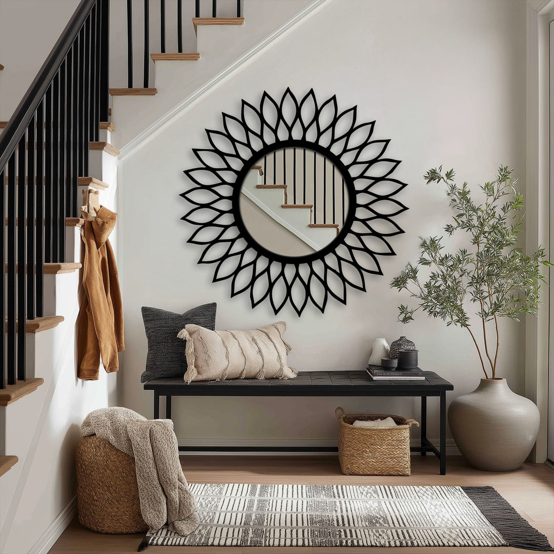 Warm lighting enhances the Radiant Leaf Halo floor modern mirror, creating a cozy ambiance in the entryway's decorative metal art.