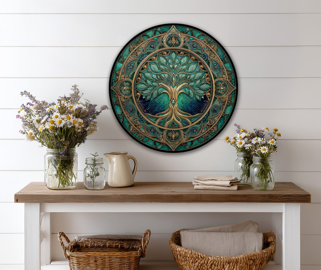 Featuring geometric elements, the emerald sacred tree is an ornate round wooden oil painting home decor accent with intricate circular patterns.