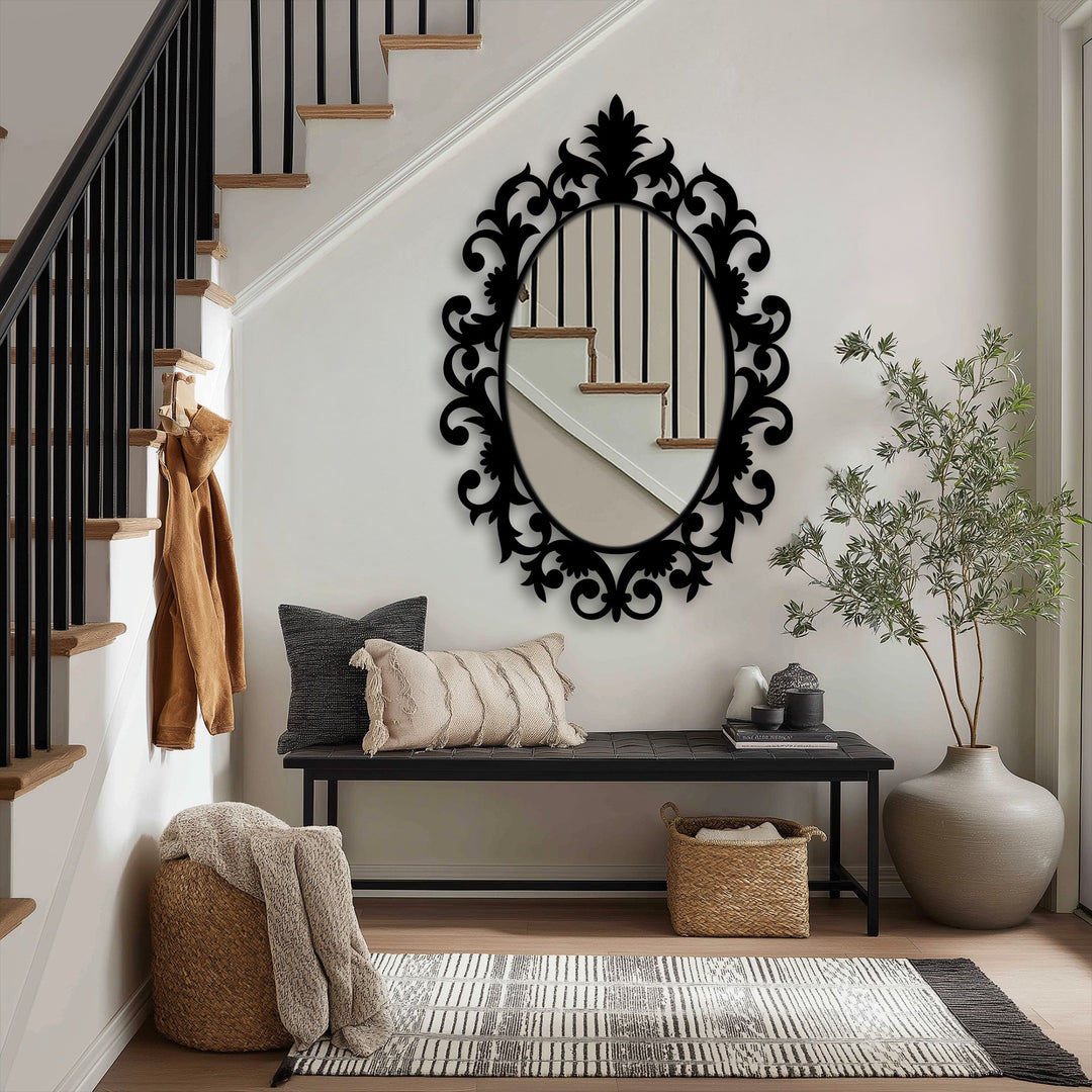 Visual rhythm in the hallway is created by the majestic crowned baroque oval floor mirror while decorating with wall mirrors, reflecting the stairs and adding depth.