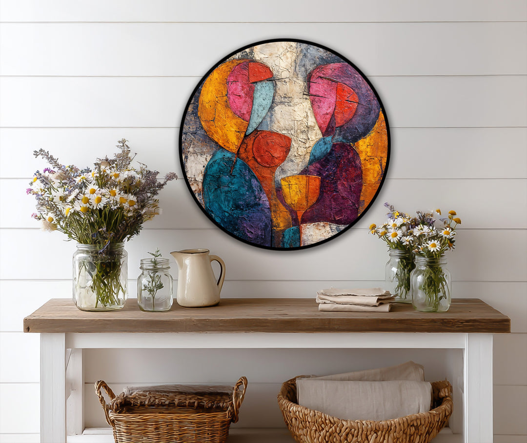 The focal point of the 'Whispers Over Wine' abstract lovers round oil painting reproduction print is the textured surface, showcasing bold colors of embracing figures.