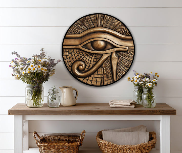 Framed with a bold, dark border, the edge of this circular Egyptian eye design enhances the ancient feel of this striking oil painting wall art.