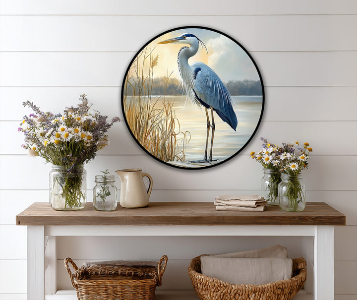 Round animal oil painting of a majestic heron is the loudest element, making it a distinctive oil painting home decor piece that captures sunrise serenity.