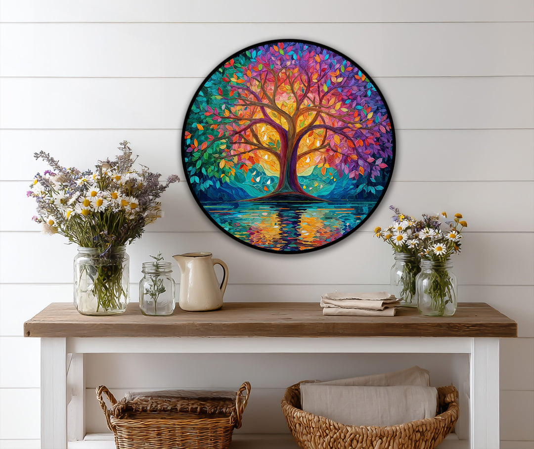 Depth and layers are suggested in this vibrant oil painting home decor image of a colorful abstract round tree of life reflecting in the waters below.