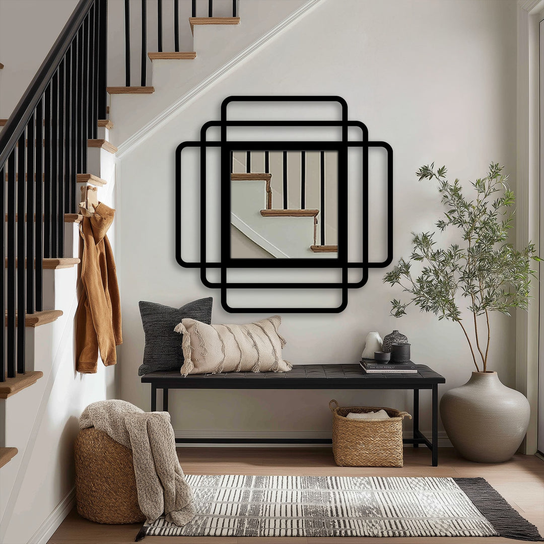 Smooth surface texture defines the layered, rounded frames of the square modern mirror, enhancing its decorative metal art appearance and geometric design.