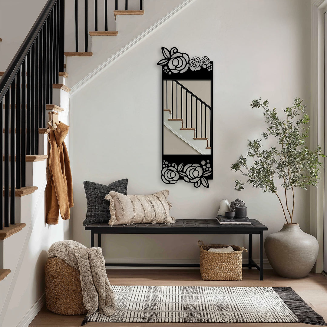 Reflecting a staircase, the Floral Elegance Black Metal Floor Mirror showcases a sophisticated design with a decorative rose motif, serving as unique metal wall art.