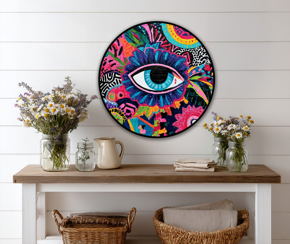 Circular, horizontal oil painting wall art showcasing a vivid mystic eye surrounded by colorful abstract patterns provides a striking focal point.