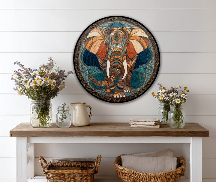 With vivid color saturation, this round oil painting wall art presents an ornate geometric elephant in a sacred mosaic style.
