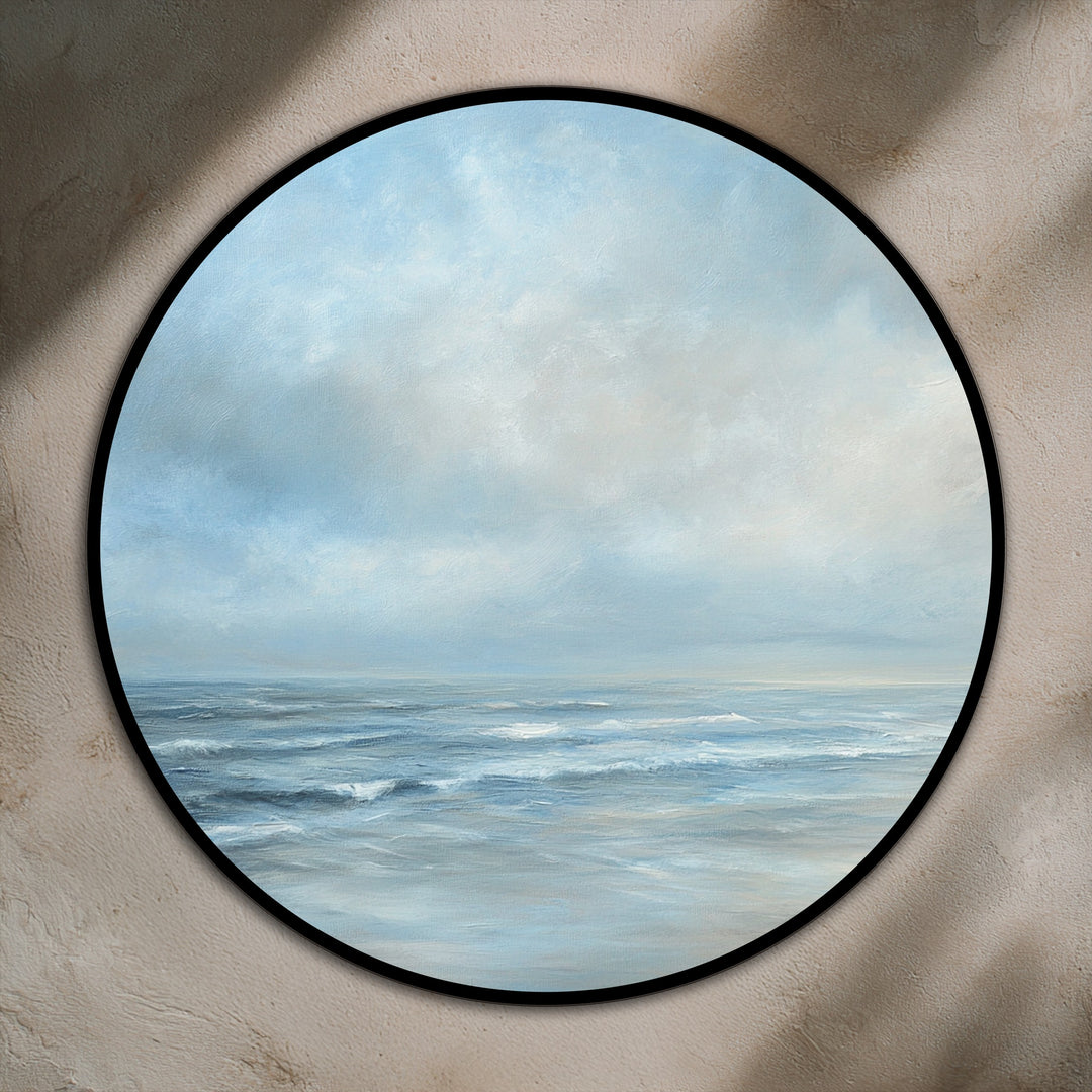 Shadows play across a serene seascape round oil painting, highlighting the depth and texture of the calming ocean waves, bringing dimension to these oil painting art prints.