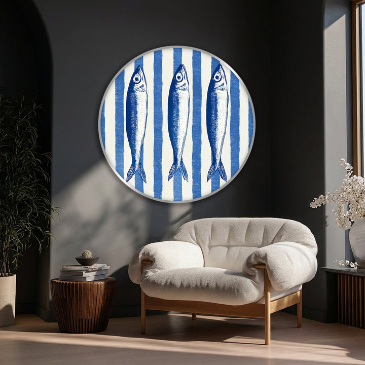 High color contrast highlights the blue coastal fish illustration in this round canvas print, a nautical canvas painting against crisp white stripes.