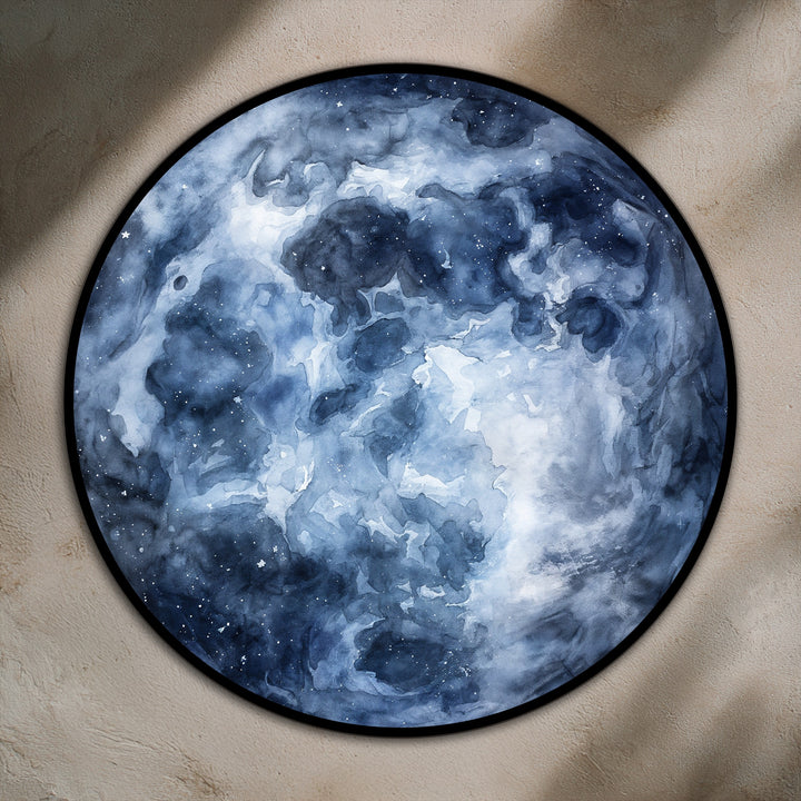 Light and shadow play across this round oil painting wall art, highlighting the textured depths within the deep blue abstract 'Midnight Nebula.'