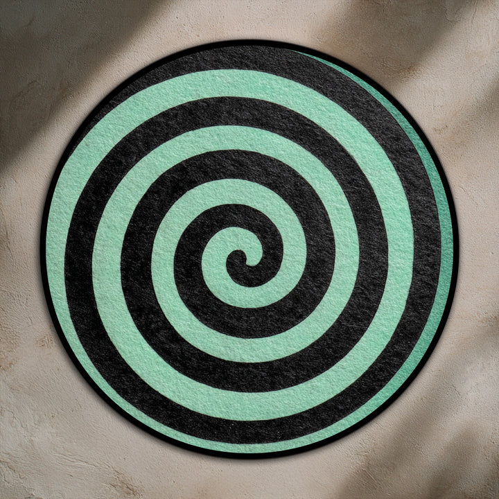 Horizontally oriented round oil painting decoration features a minimalist black spiral on a mint background, creating a modern abstract design.