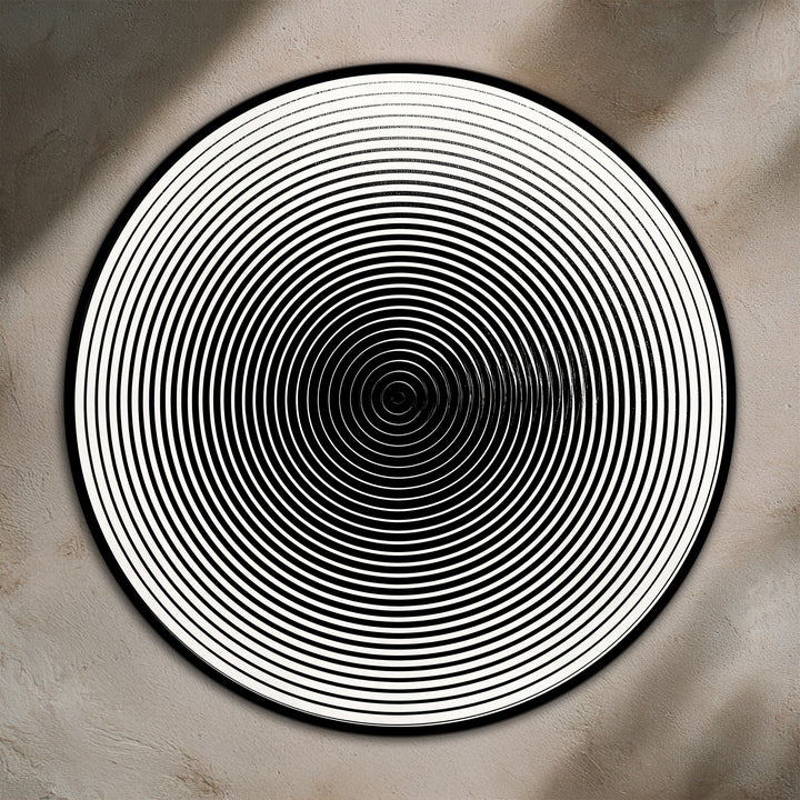 Alternating light and shadow highlight the concentric line patterns of this minimalist round wooden oil painting art piece, creating a visually hypnotic effect.